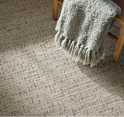 Laminate flooring samples in modern wood tones
